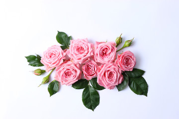 beautiful composition of roses on a pastel background with space for text insertion. minimalism, design, idea. 