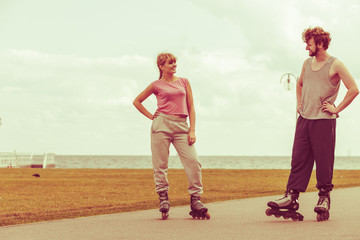 roller skater couple skating outdoor