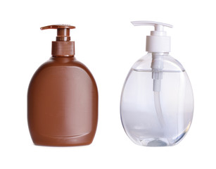Brown and transparent Plastic Bottles with  liquid soap on a white background.