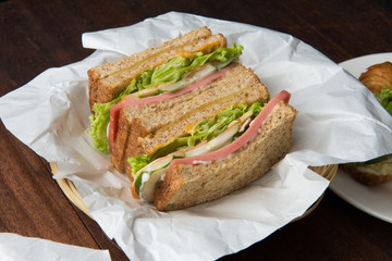 ham sandwich with wood background