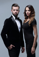 Business partners standing on a gray background