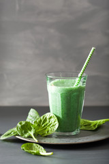 green spinach smoothie with spirulina, chia seed, lime, apple