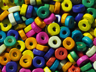 close-up punched beads in different colors for background