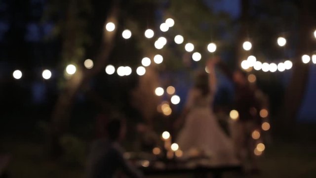 Beautiful dance beloved couple with night lights nature