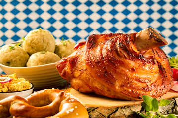 Roasted pork knuckle with gourmet side dishes