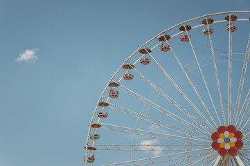 Ferris Wheel ride with blue sky