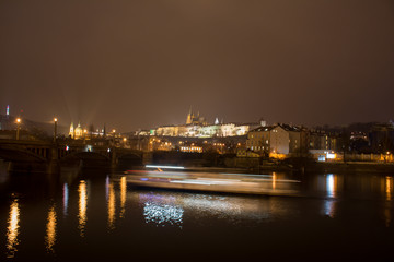 Fototapeta na wymiar St Vitus Cathedral view over Vltava river & Charles Bridge. Cityscape