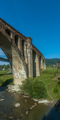 Fototapeta na wymiar Old viaduct. the city of Vorokhta. Ukraine.