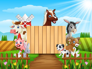 Obraz na płótnie Canvas Farm animals with a blank sign wood