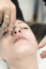 woman in a Threading