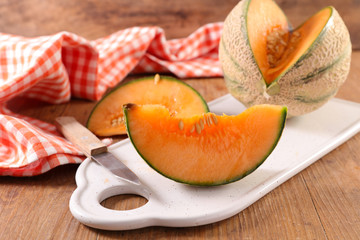 melon slice on board