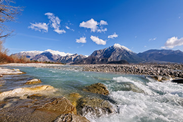 Fototapeta na wymiar Mountain landscape with river. Italy Alps