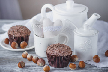 Teapot, cupcakes and different decorations