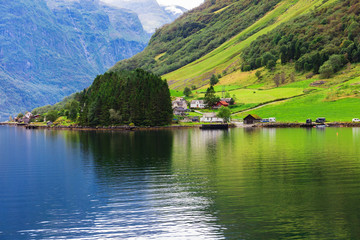 Obraz premium small town in norwegian fiord, Norway