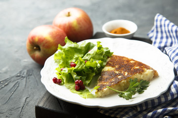 Fried Swiss potato pancake with apples