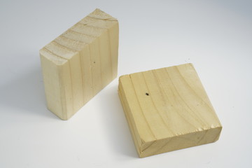 Small wooden blocks on a white background