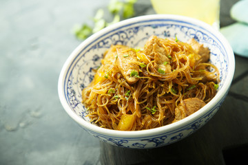Rice noodles with meat and soy sauce