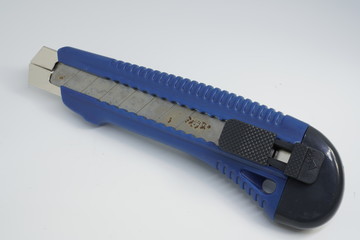 Cutter knife on a white background
