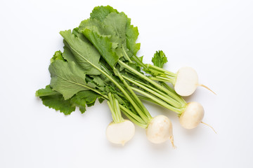 Fresh white round turnip radish on white background.