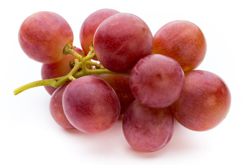 Ripe red grape isolated on white.