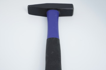 Hammer with pins on white background