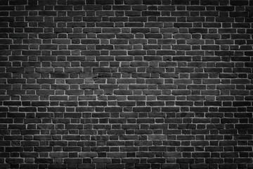 Fototapeta na wymiar Dark grey brick wall texture - urban grunge black masonry background