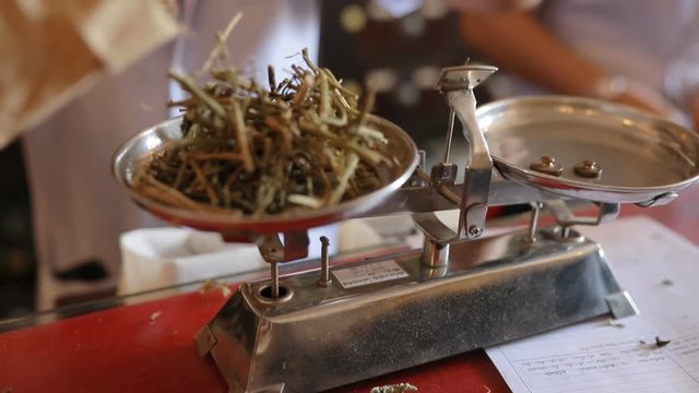thai herb on old balancing measurement