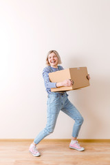 Photo of girl with cardboard box