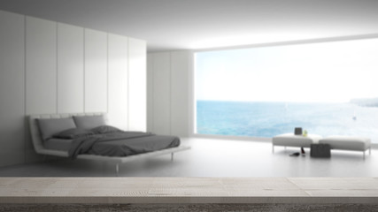 Wooden vintage table top or shelf closeup, zen mood, over blurred minimalist bedroom with big window on sea panorama, white architecture interior design