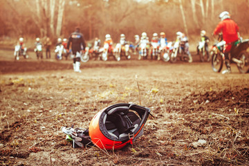 biker helmet lying on the ground