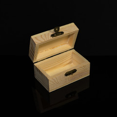 wooden box on black background