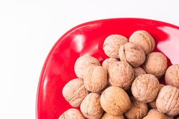 walnuts in red plate