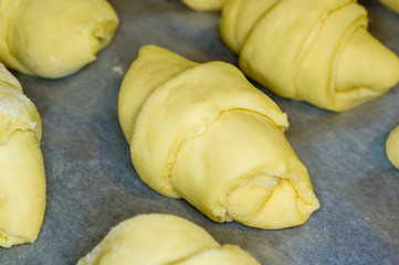 raw homemade croissants with sweet filling