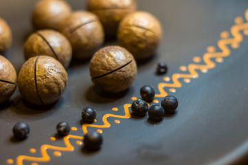 macadamia, Australian nut in a ceramic plate