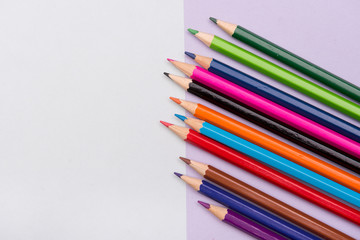 school supplies on colorful backgrounds