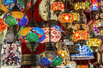 Fototapeta na wymiar Multi-colored lamps hanging at the Grand Bazaar in Istanbul, Turkey