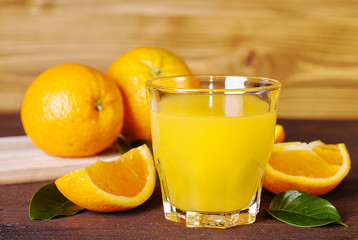 glass of orange juice on a table