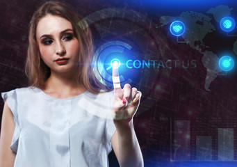 The concept of business, technology, the Internet and the network. A young entrepreneur working on a virtual screen of the future and sees the inscription: Contact us