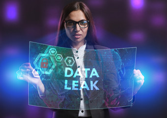 The concept of business, technology, the Internet and the network. A young entrepreneur working on a virtual screen of the future and sees the inscription: Data leak