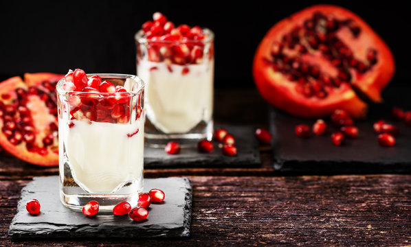 Pomegranate seeds on yogurt - dessert on Slate