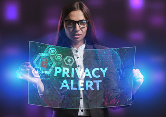 The concept of business, technology, the Internet and the network. A young entrepreneur working on a virtual screen of the future and sees the inscription: Privacy alert