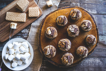 S'more Cupcakes with Graham Cracker, Marshmallow, and Chocolate