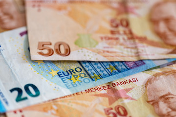 Obraz premium Turkish and European currency - close-up of mixed Lira and Euro banknotes