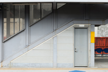 Fototapeta premium sidewalk by street wall & door