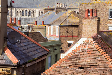 Broadstairs, UK - April 10, 2018 - Roofs, walls, windows of old brick buildings