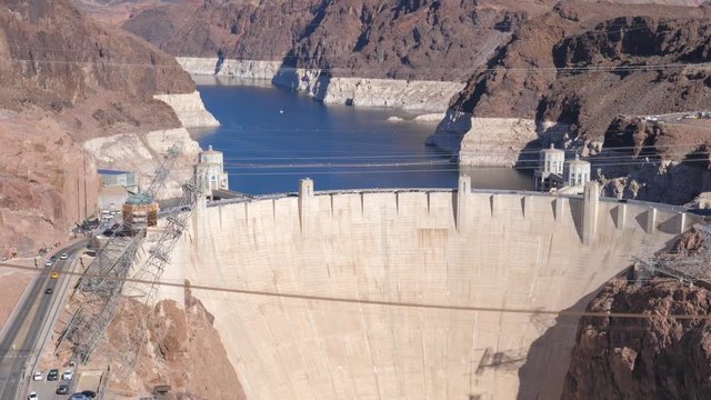 A Big Concrete Hoover Dam Among The Rocks Of The Black Canyon