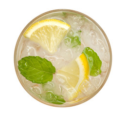Fresh cocktail lemonade, honey lemon soda with yellow lime slice and mint top view isolated on white background, clipping path include