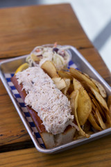 Lobster Roll with Potato Chips and Coleslaw