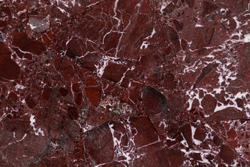The red marble. Texture.