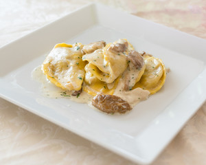 Tortellini with cream sauce and mushrooms